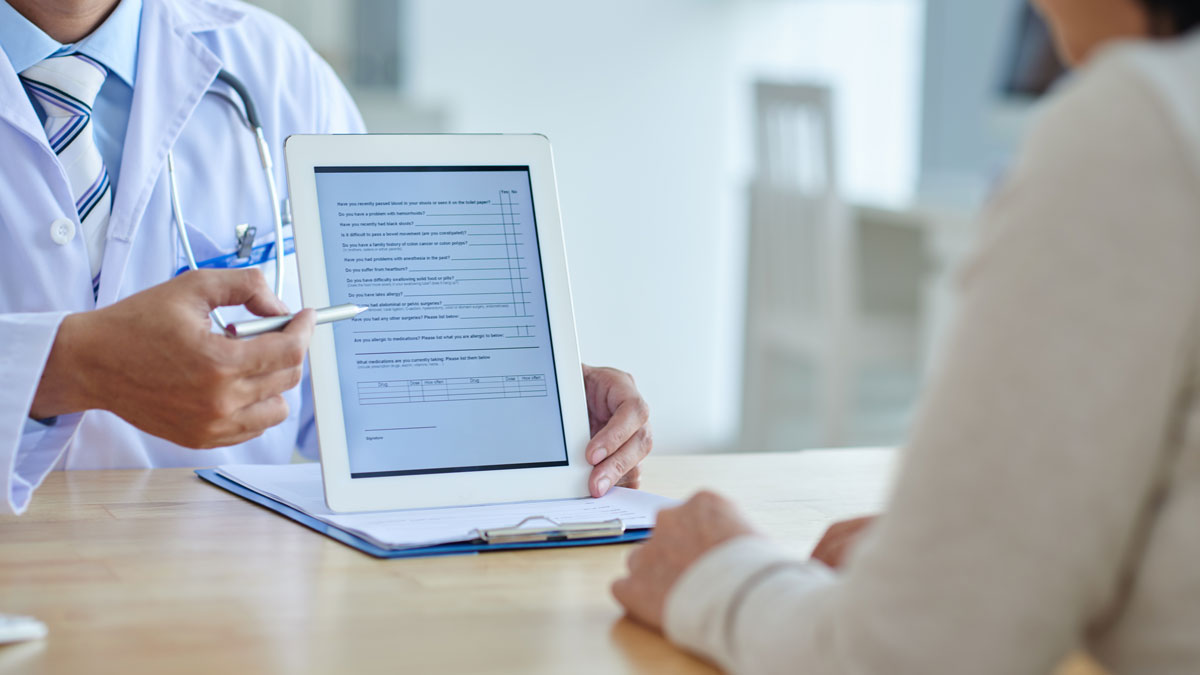 doctor using tablet
