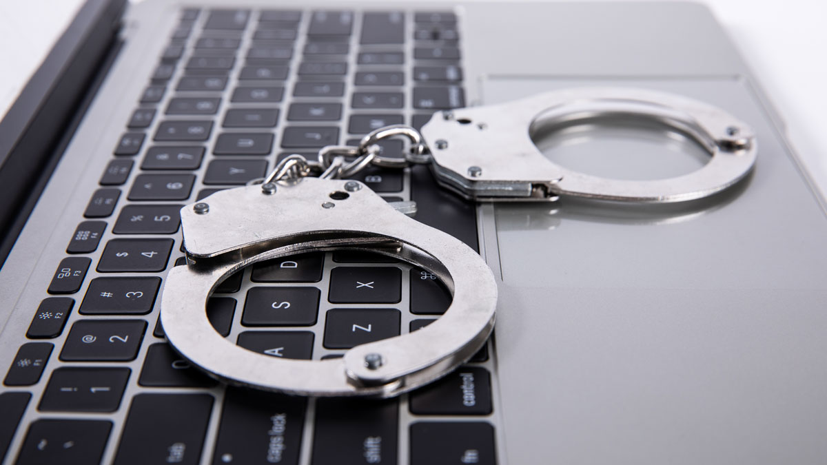 handcuffs on laptop