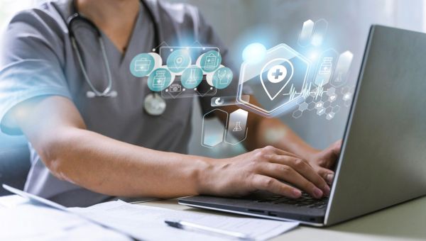 healthcare worker using laptop