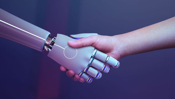 robot hand shaking human hand